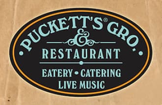 Logo de Puckett's Grocery USA