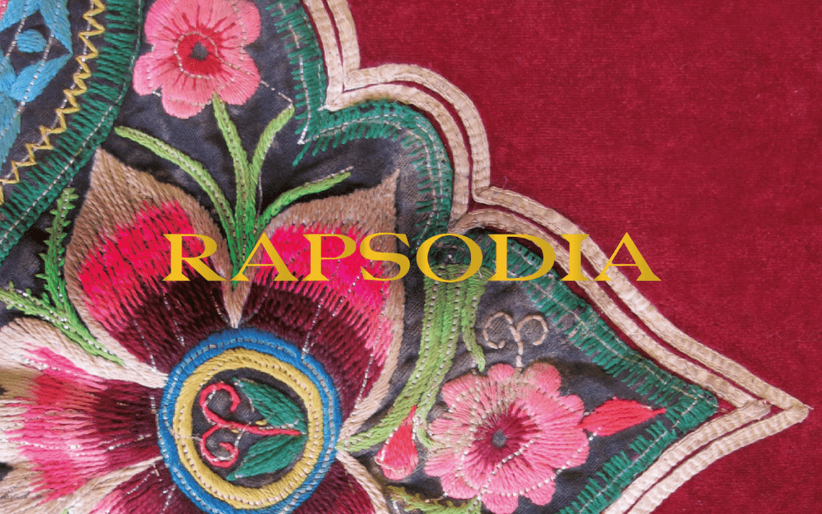 Rapsodia Uruguay logo