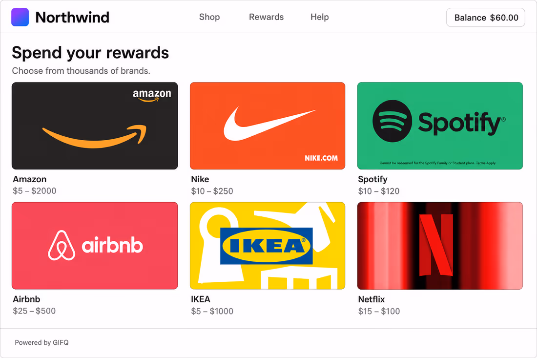 A rewards storefront branded Northwind, selling Amazon, Nike, Spotify, Airbnb, IKEA and Netflix gift cards with their price ranges, and a small Powered by GIFQ line in the footer